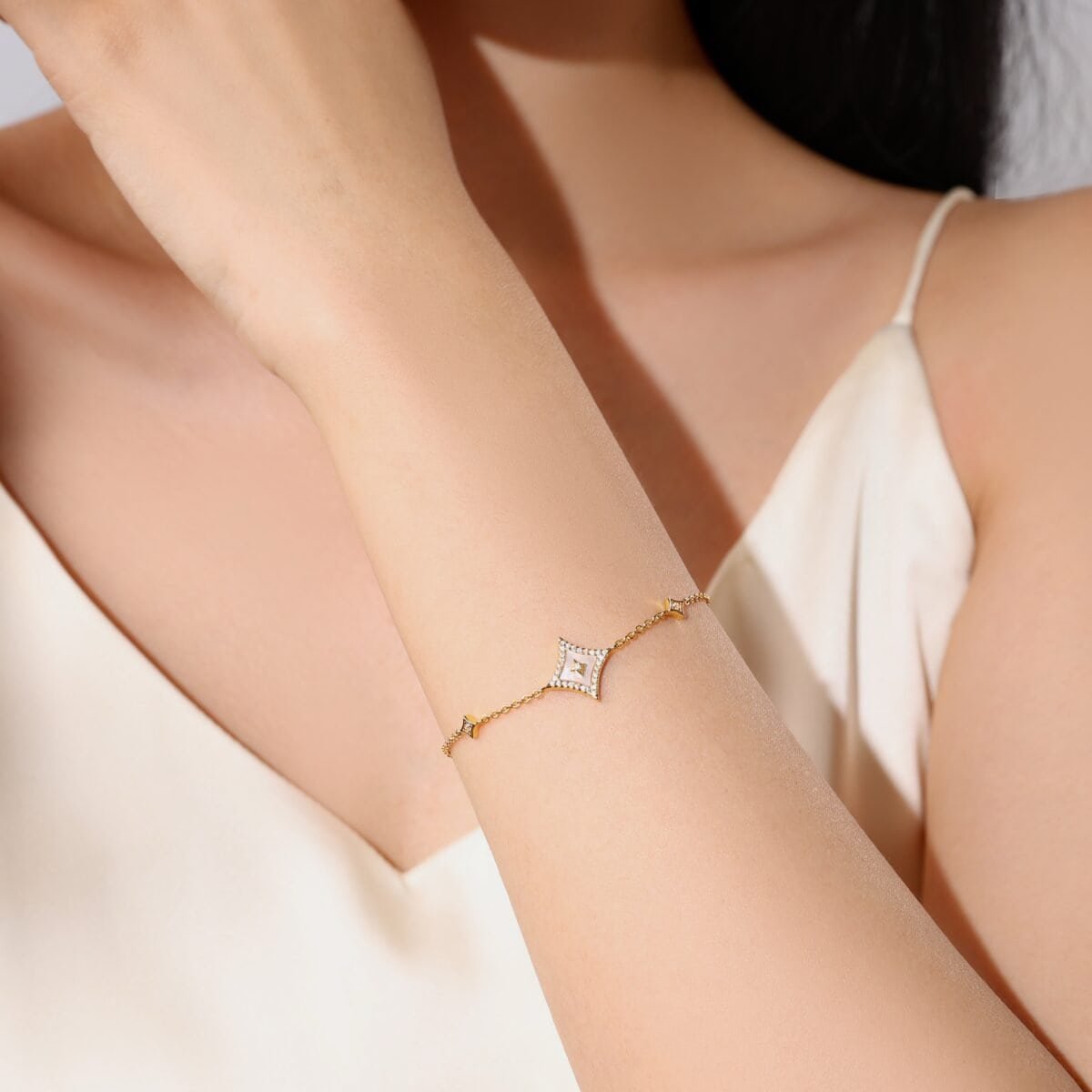 Elegant gold and diamond bracelet featuring a contemporary design, perfect for adding a touch of luxury to any outfit. Crafted with high-quality materials by Capella.